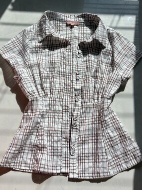 brown plaid button up.